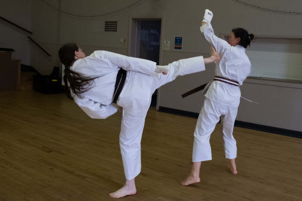 Brown and Black Belts sparring Kumite